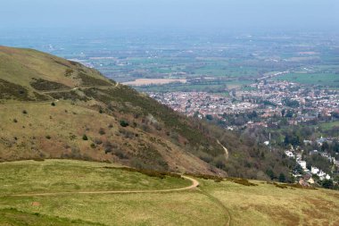A view from Worcestershire Beacon showing some of the network of footpaths that criss-cross the Malvern Hills, Worcestershire, UK clipart