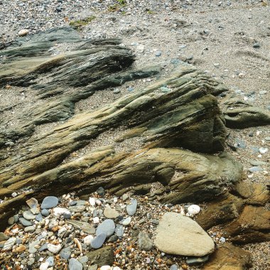 Cornwall plaj graniti tam çerçeve arkaplan dokusu. Telefon ya da tablet işlemleri içeren cep telefonu fotoğrafı.