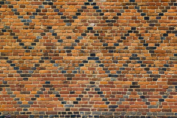 古いパターン化された赤レンガの壁フルフレームテクスチャの背景 — ストック写真