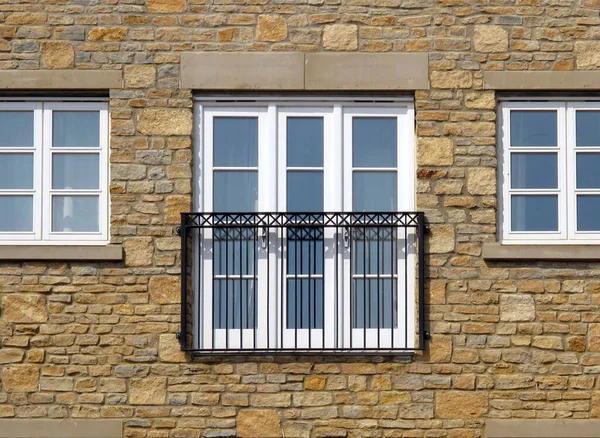 Contemporary Juliet Balcony Three Windows Stone Wall — Stock Photo, Image