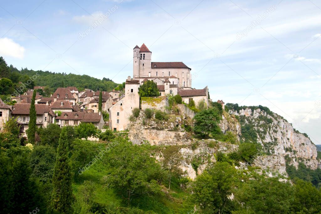 The historic clifftop village tourist attraction of  St Cirq Lapopie in the Lot Valley, Lot, France