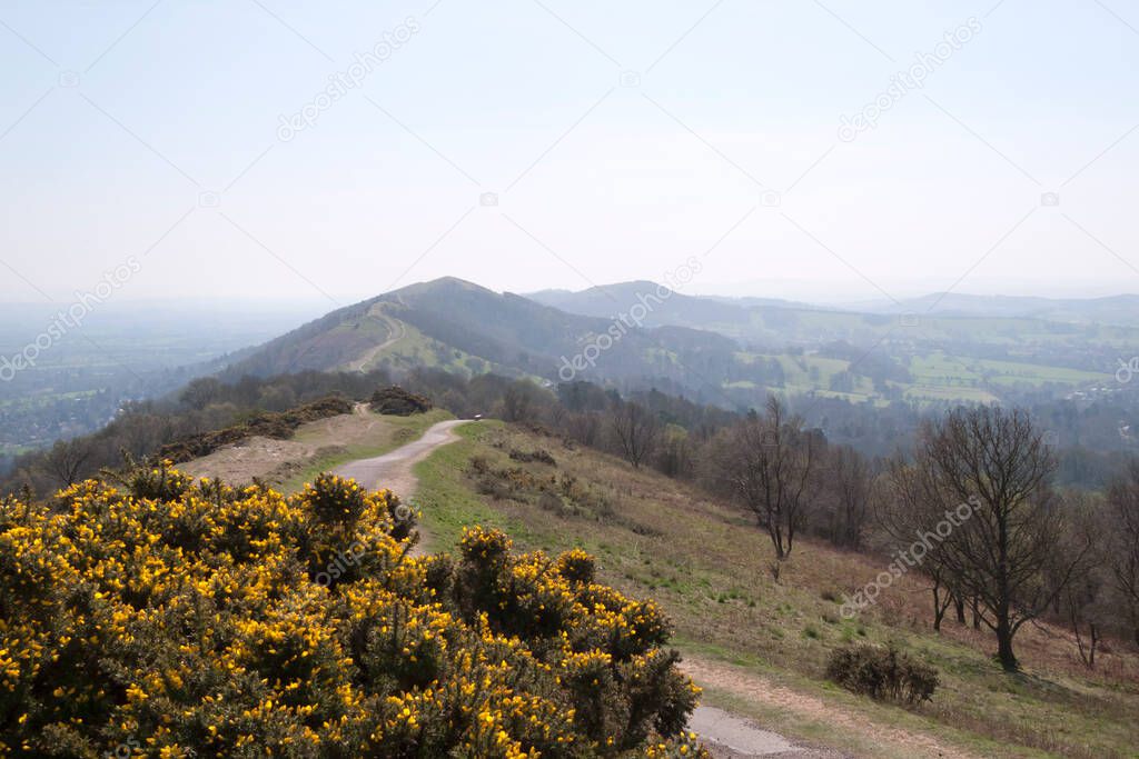 A gentle footpath up the slopes of the Malvern Hills leads to the toposcope and memorial on the highest point at Worcestershire Beacon, Worcestershire, UK