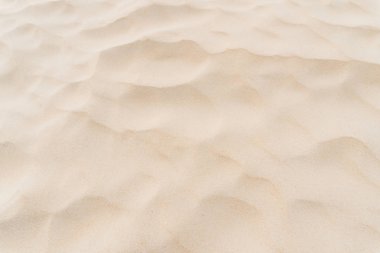 Kum plajı dokusunun soyut arkaplanını kopyala. Yaz tatili ve seyahat rahatlama konsepti. Klasik ton filtre efekti renk biçimi.