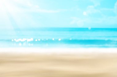 Tropikal plaj ile bokeh güneş ışık dalga arka plan bulanıklık.