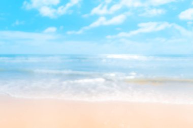 Tropikal plaj ile bokeh güneş ışık dalga arka plan bulanıklık.