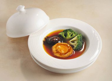 Braised abalone with broccoli and mushroom clipart
