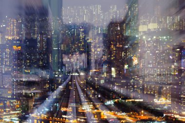 Gece hareket tren bulanık bokeh şehir residence şehir ışık, soyut arka plan üzerinde izlemek