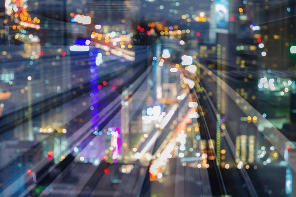Çift Pozlama gece şehir iş şehir ve hareket tren yolu, arka plan bulanıklık