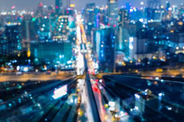 Gece şehir yol kavşak bulanıklık hafif çift kişilik maruz parça hareket tren, arka plan 