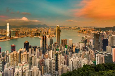 Hong Kong merkezi iş ofis binası ile günbatımı manzarası arka plan