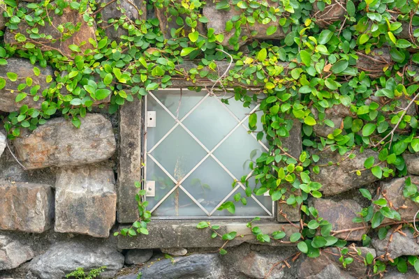 Rock Wall Small Glasses Window Background Texture — Stock Photo, Image