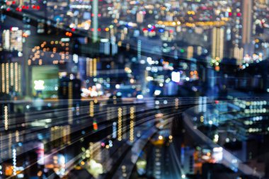 Havadan görünümü bulanıklık bokeh ışık şehir şehir gece görünüm eğri, soyut arka plan hareketli tren yolu üzerinde