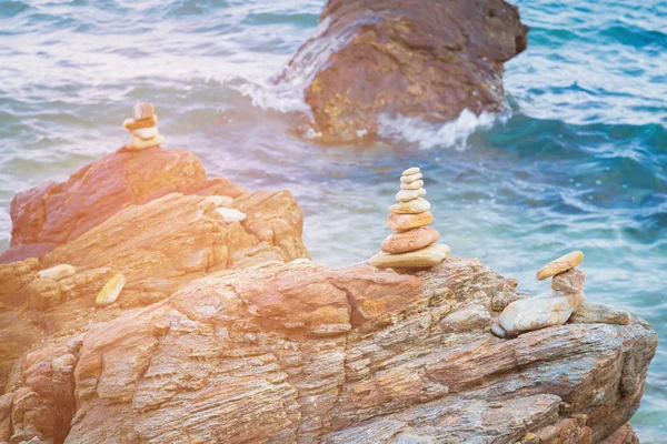 Stack rock on sea beach, natural abstract background