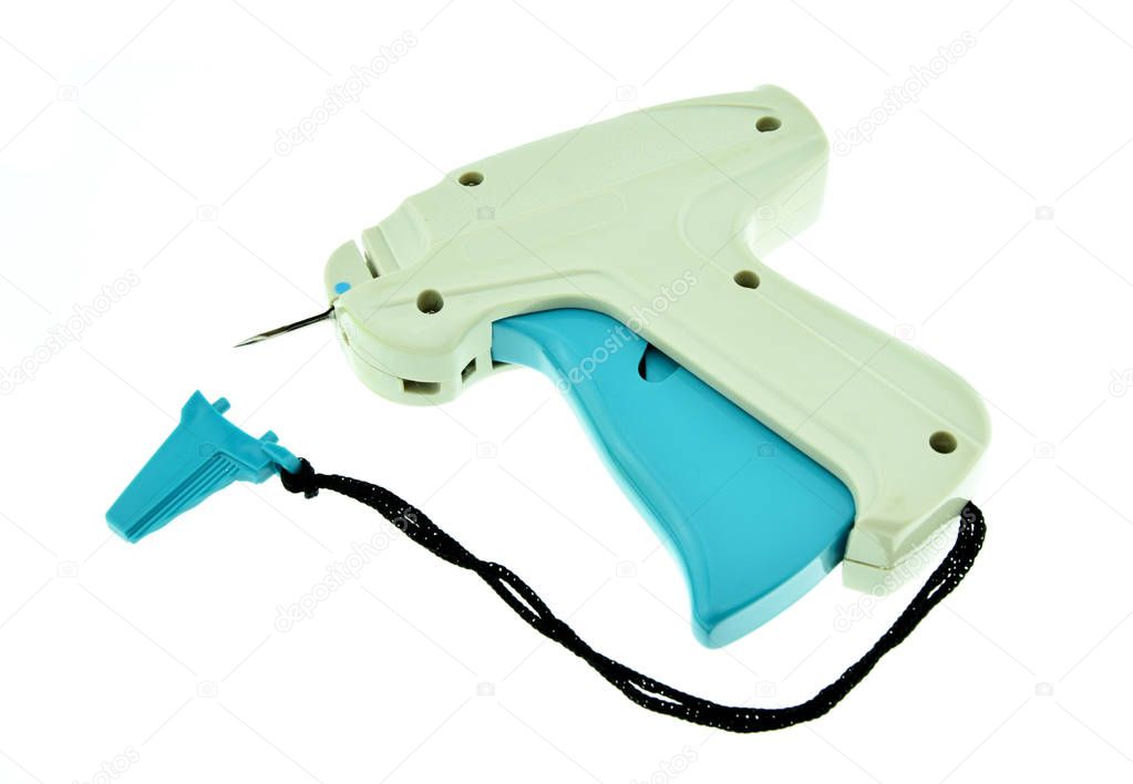 label tagging gun on a white background