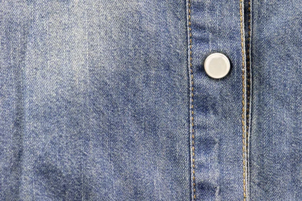Buttons on jeans background — Stock Photo, Image