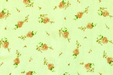 çiçek desenli kumaş dokusu üzerinde.