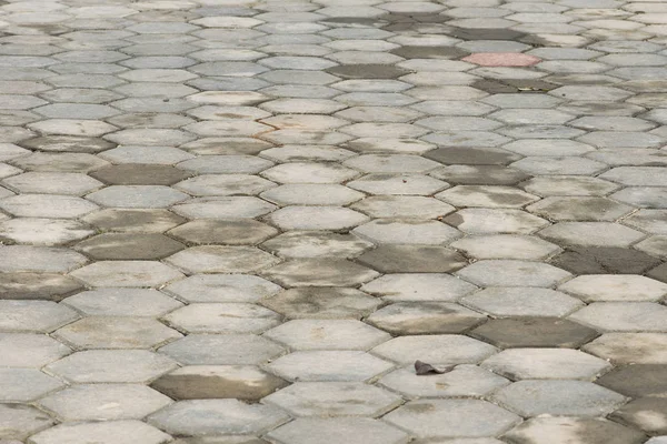 Lastre di pavimentazione, piastrelle di pavimentazione a motivi geometrici, cemento mattone pavimento backgrou — Foto Stock