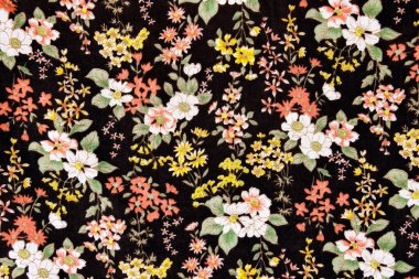 Çiçek arkaplanlı kumaş deseni