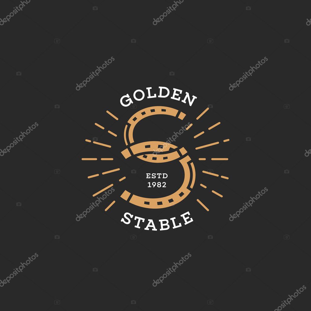 Golden stable. Two horseshoes logo design. Stylized letter S. Vector illustration.