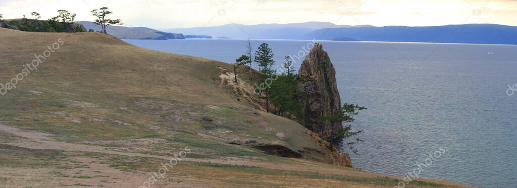 Landscape Lake Baikal, eastern Siberia, Irkutsk region, Russia. Panorama of the lake, mountains, rocks, water