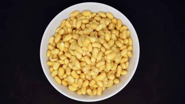 Soybeans Soaking Hours Bowl Black Background View — Stock Photo, Image