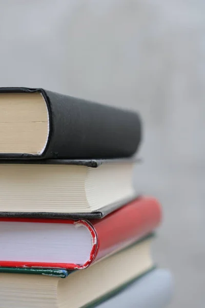 Stack of books on a wooden box