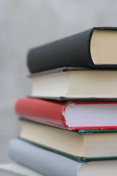 Stack of books on a wooden box