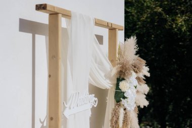 Düğün töreni. Gelin ve damadın kemeri.,