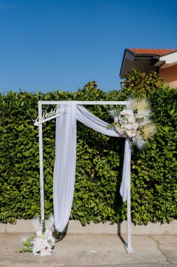 Düğün töreni. Gelin ve damadın kemeri.,