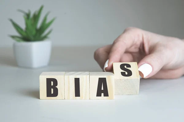 Bias - word from wooden blocks with letters, personal opinions prejudice bias concept, white background — Stock Photo, Image