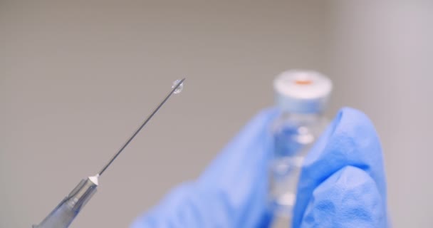 Extreme Close Hand Holding Syringe Vaccine Hand Laboratory — Stock Video