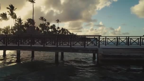 Drone Footage Wooden Pier Jetty Lagoon Palms Beach Cloudy Sky — Stock Video