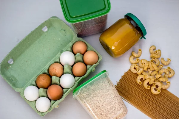 Donations food with eggs, pasta and rice.