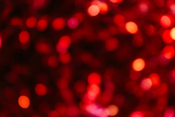 Siyah arkaplanda kırmızı bokeh, odak dışı, kırmızı arkaplan, bulanık arkaplan, odak dışı yuvarlak ışıklar, yatay.