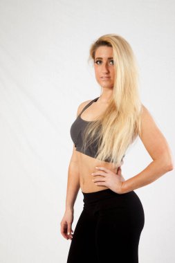 Egzersiz kıyafetli güzel sarışın.