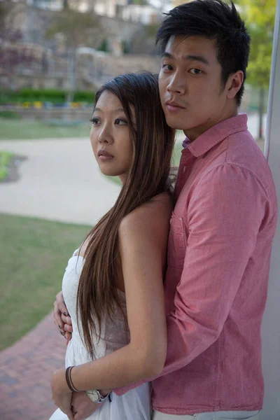 Asian Couple in a loving embrace