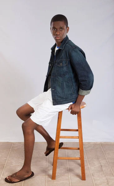 Handsome Black Man Sitting Thoughtfully — Stock Photo, Image