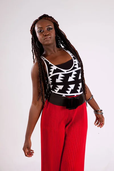 Lovely Black Woman Red Slacks Looking Thoughtful — Stock Photo, Image