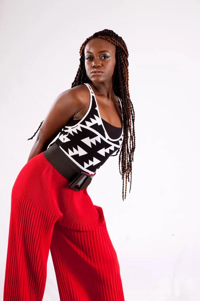 Lovely Black Woman Red Slacks Looking Thoughtful — Stock Photo, Image