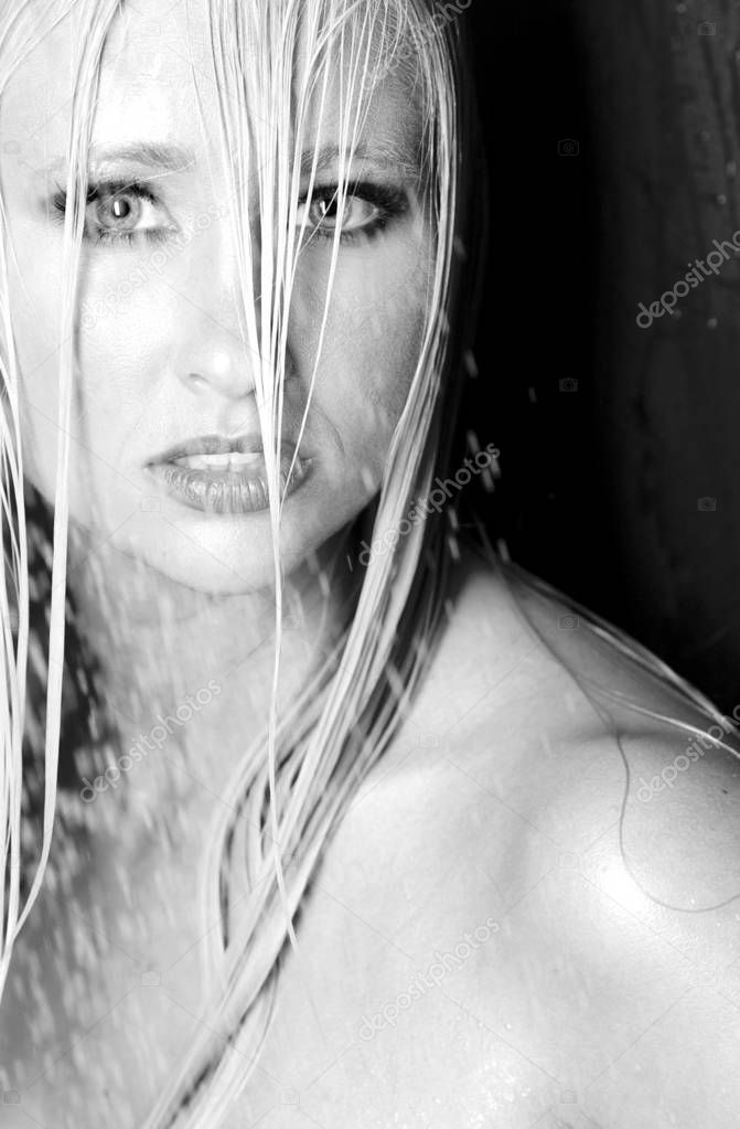  Face closeup of pretty lovely girl in shower - monochrome 