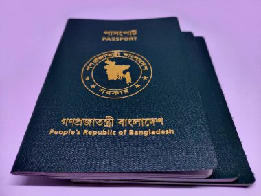 Passports of Bangladesh over white background. clipart