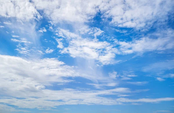 Blue sky and white puffy clouds