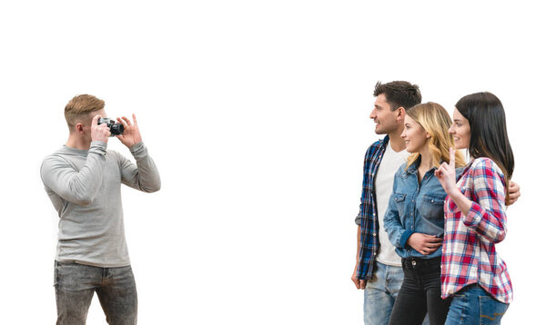 The four people make a photo on the white background