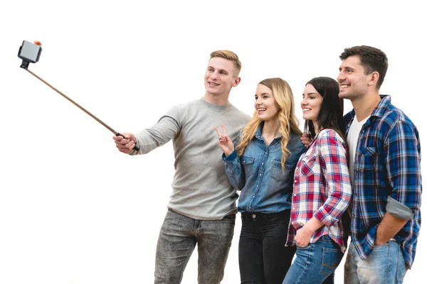Quatro Amigos Felizes Fazem Uma Selfie Fundo Branco — Fotografia de Stock