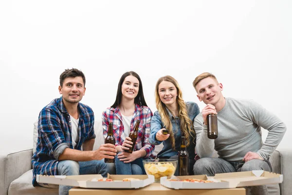 The four people watch tv with a pizza and a beer on the white background