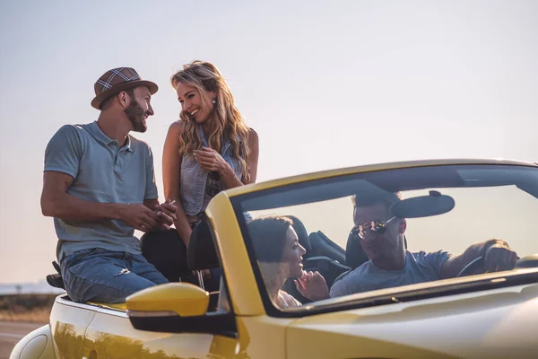 The romantic date in a yellow cabriolet