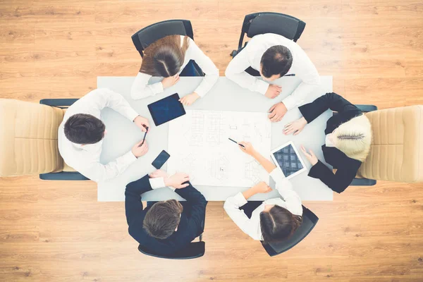 Los Empresarios Trabajan Con Dibujo Sobre Mesa Vista Desde Arriba —  Fotos de Stock