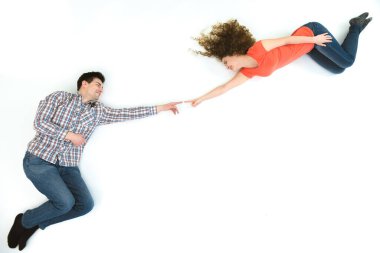 The couple gesture on the white background. View from above