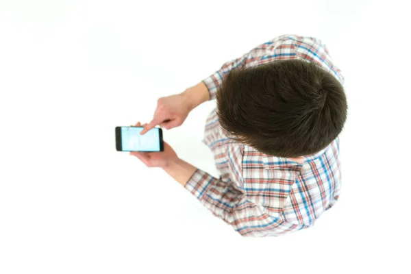 Muž Smartphonem Stojí Bílém Pozadí Pohled Shora — Stock fotografie