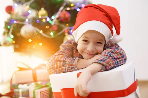 Smile Boy Sit Gift Box Christmas Tree Sunny Background — Stock Photo, Image